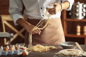A chef making handmade pasta in Singapore
