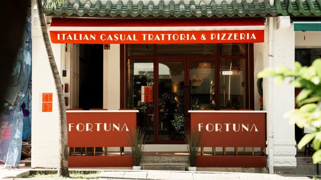  Fortuna italian restaurant front. Red awning hangs overhead

