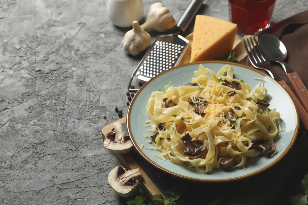 Enjoying a plate of freshly grated truffle pasta in Singapore.