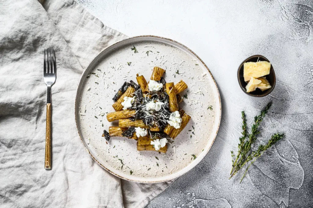 A plate of truffle pasta in Singapore and penne pasta