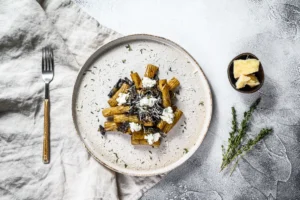 A plate of truffle pasta in Singapore and penne pasta