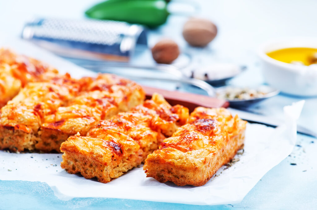 Sicilian-style pizza served on a table