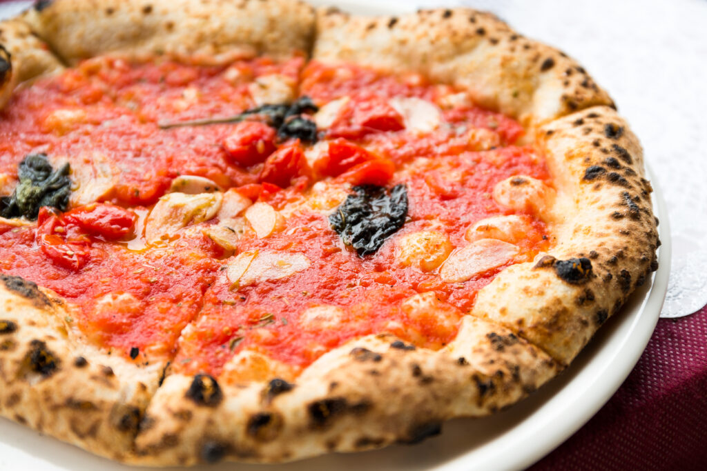 a neapolitan pizza on the table